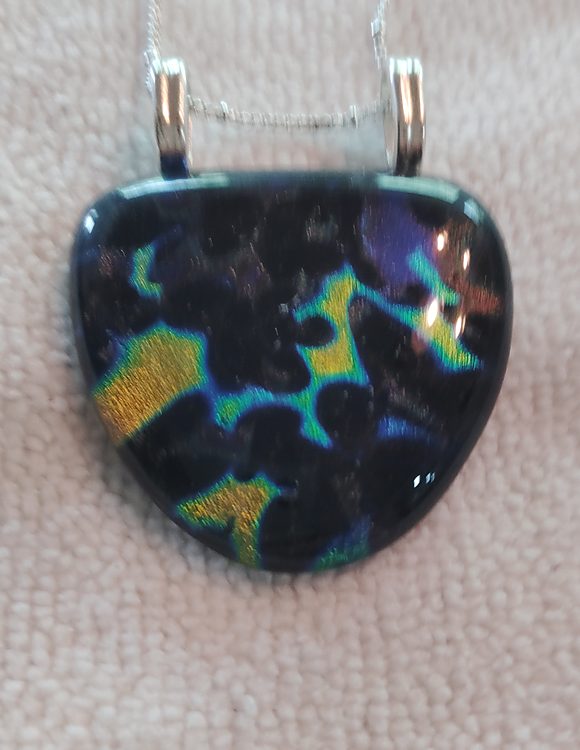Rounded triangular pendant, black glass with turquoise, gold and violet flashes